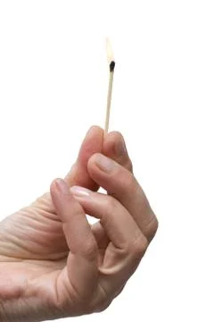 Hand holding a matchstick Stock Photos