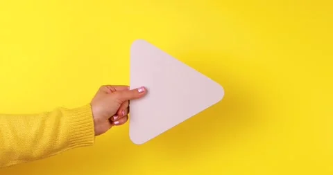 Hand Holding Media Player Button Stock Footage 324855336