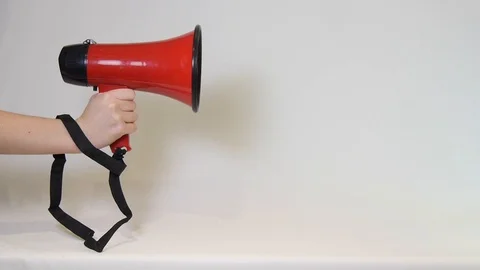 Hand Holding a Megaphone Stock Footage 100691176
