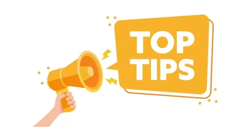 Hand holding megaphone with top tips speech bubble on white and green screen Stockbeeldmateriaal 309523087