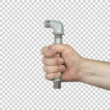 A hand is holding a metal pipe fitting. Photos