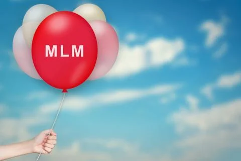 Hand Holding MLM or Multi level marketing Balloon Stock Photos