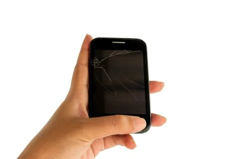 Hand holding a mobile with broken screen. Stock Photos