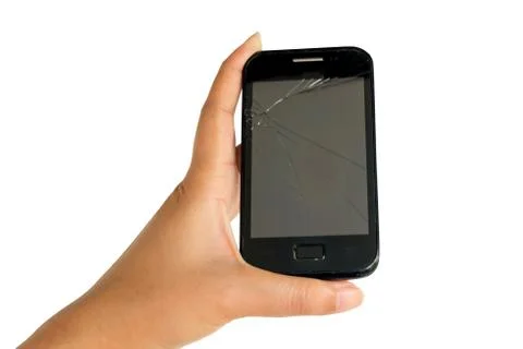 Hand holding a mobile with broken screen. Foto stock