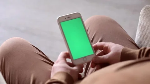 Hand holding mobile phone, soft focus Stock Footage 221242294