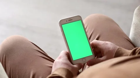 Hand holding mobile phone, soft focus Stock Footage 221242295