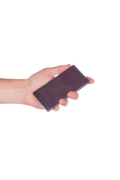Hand holding a mobile Stock Photos