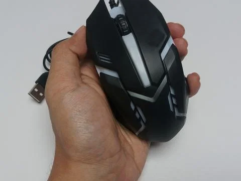 Hand Holding Modern Wired Computer Gaming Mouse on White Stock Photos