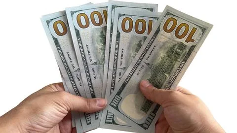 Hand Holding Multiple US Dollar Bills Stock Photos