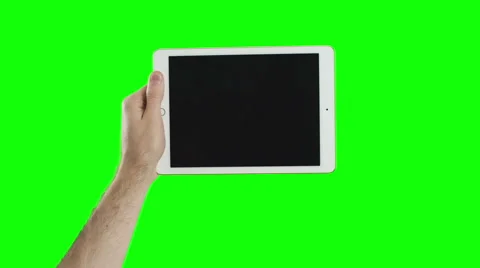 Hand holding the new tablet on green screen 4K Stock Footage 50183971