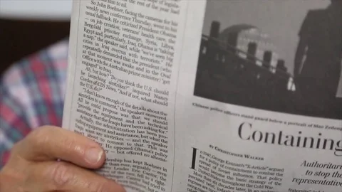 Hand Holding Newspaper Stock Footage 75212248