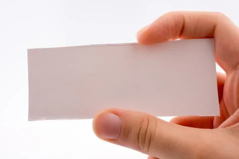 Hand holding a note paper  Stock Photos
