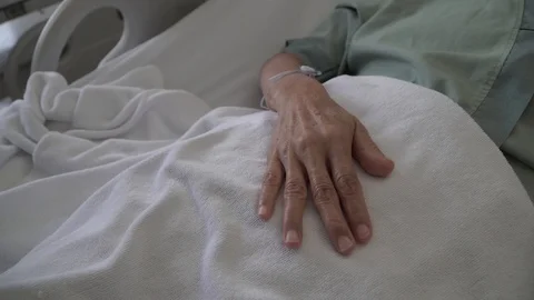Hand holding old age hand givinvh emotaional support at hospital3 Stock Footage 112874169