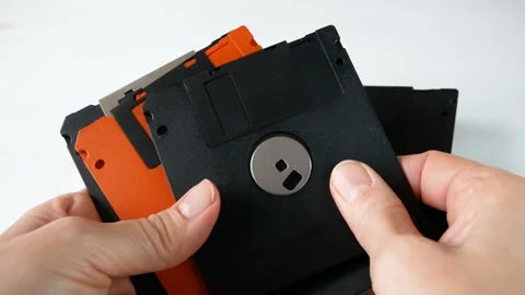 hand holding the old computer floppy dis... | Stock Video | Pond5
