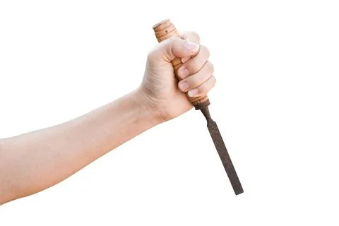 Hand holding old rusty chisel isolated on white background with clipping path Stock Photos