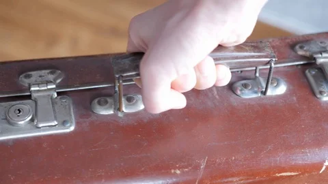 Hand holding an old suitcase Stock Footage 87496800