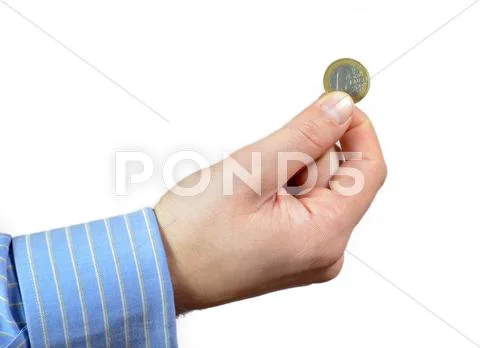 Hand holding one euro coin Stock Photos