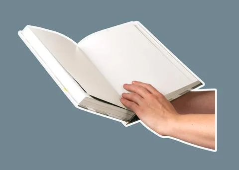 Hand holding an open book with blank pages, symbolizing space for knowledge a Stock Photos