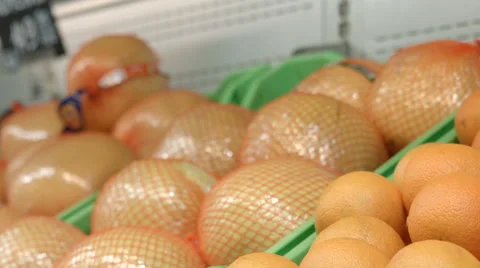 Hand holding a orange Stock Footage 67981166