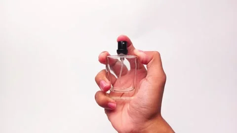 Hand holding parfum Stock Footage 295538396