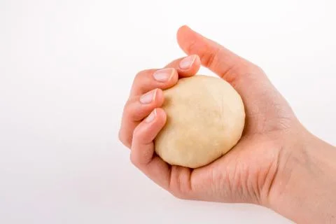 Hand holding paste Fotos de archivo