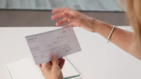 Hand Holding Paycheck Envelope. Employee Receiving Payment Stock Footage 314138273