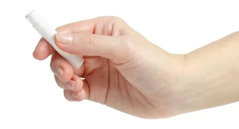 Hand holding perfume sampler Stock Photos