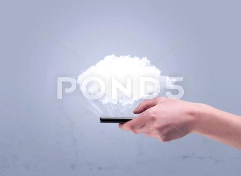 Hand holding phone with empty cloud Stock Photos