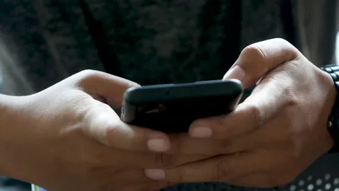 Hand holding phone Stock Footage 167535688