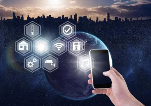 Hand holding phone with icons interface of internet of things Foto stock