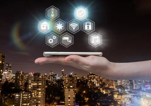 Hand holding phone with icons interface of internet of things Stock Photos