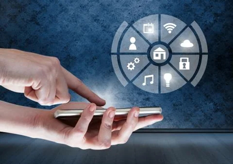 Hand holding phone with icons interface of internet of things Stock Photos
