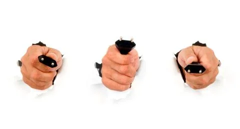 Hand holding a plug Foto stock