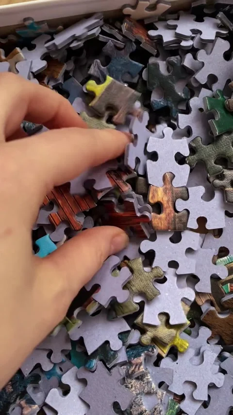 Hand holding a puzzle Stock Footage 289144551