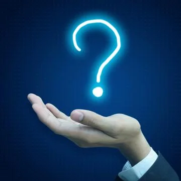 Hand holding question Foto stock