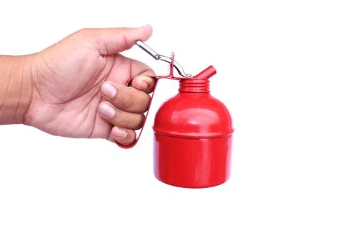 Hand holding red bottle pumping on isolated Stock Photos