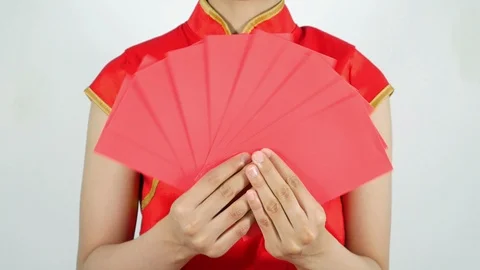 Hand holding red envelope in concept of happy chinese new year Stock-Footage 85542567
