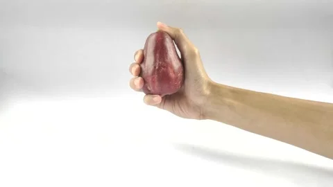 Hand Holding A Red Guava Stock Footage 299128549