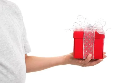 Hand holding red present Stock Photos