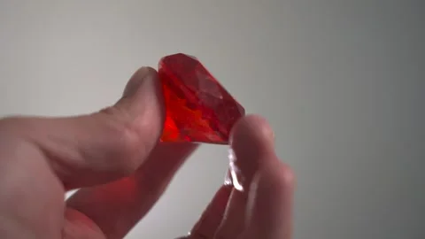 Hand Holding Red Ruby Diamond, Precious Gem Crystal Stock-Footage 301659577