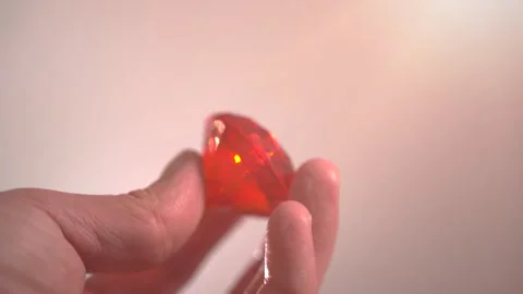 Hand Holding Red Ruby Diamond, Precious Gem Crystal Stock Footage 301660864
