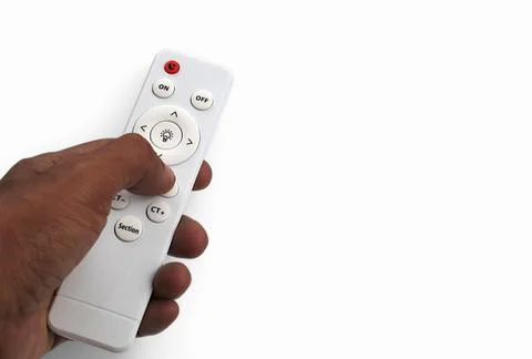 Hand holding remote control and press button Stock Photos