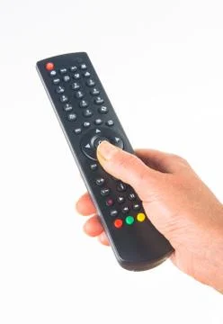 Hand holding a remote control Stock Photos