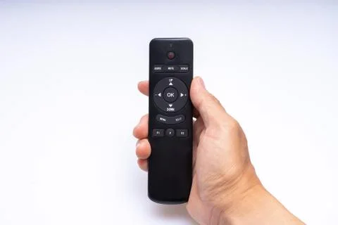  Hand holding a remote control Stock Photos