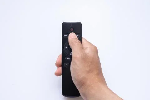  Hand holding a remote control Stock Photos
