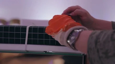 Hand holding self lock plastic cable Stock Footage 82706659