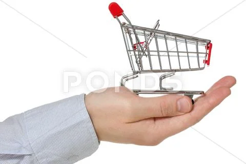 Hand holding shopping cart Stock Photos