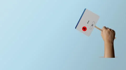 A hand holding up a sign designed like a computer system error pop-up windo.. Stock Photos