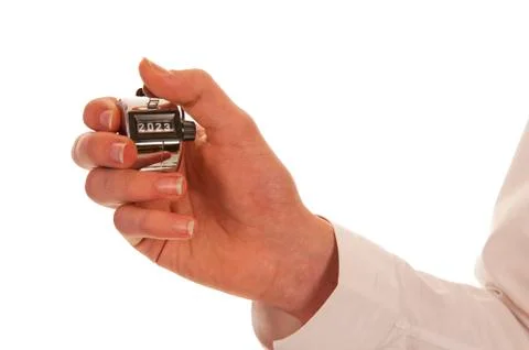 Hand holding a silver pedometer Stock Photos