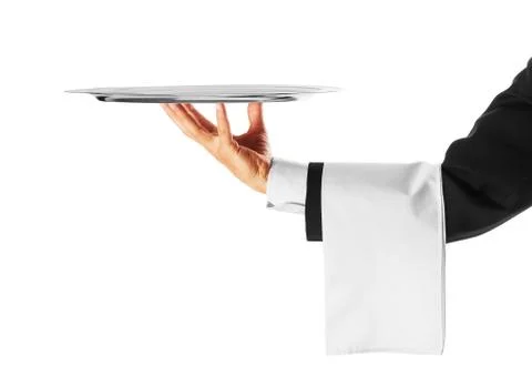 A hand holding a silver tray Stock Photos